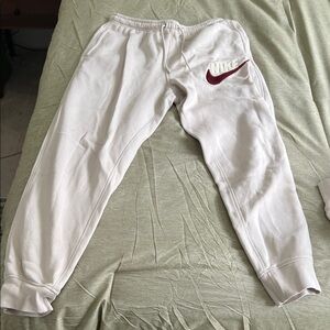 Nike men’s White and Red Sweatpants